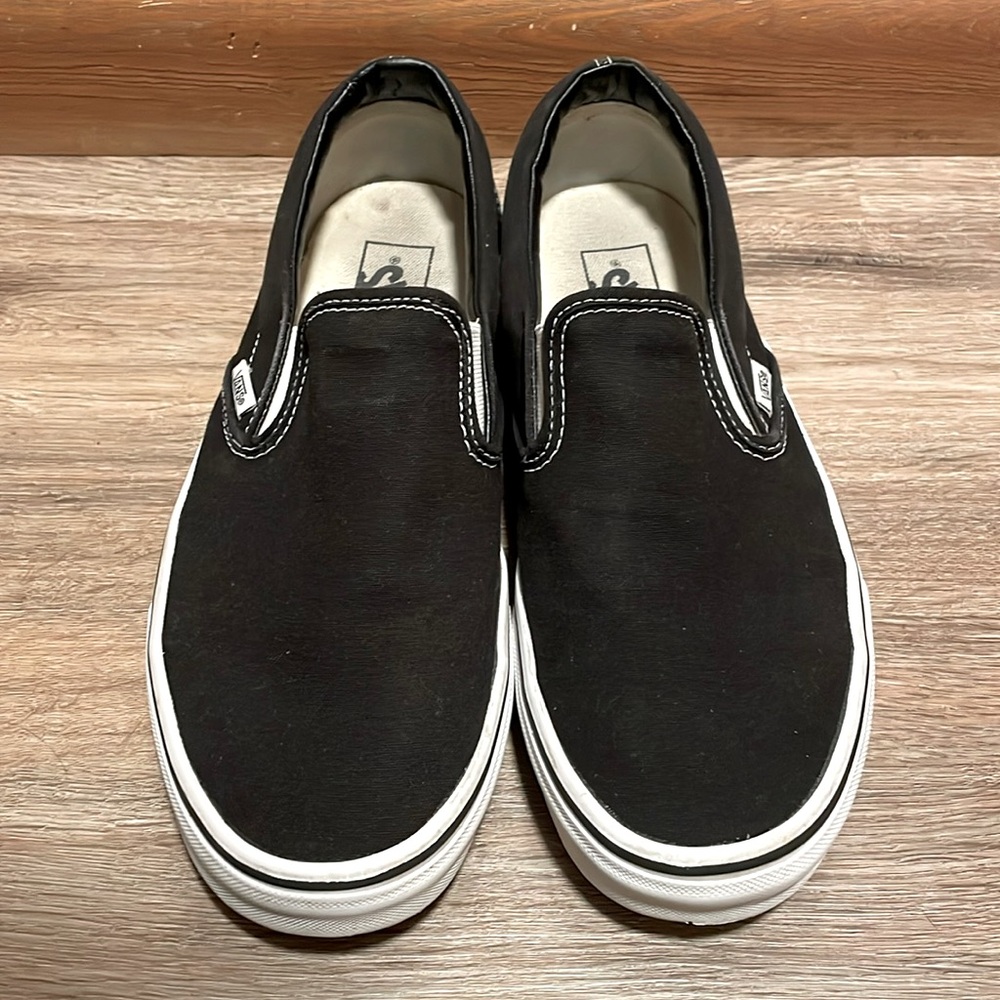 Black Slip On Vans
M 9.5 W 11